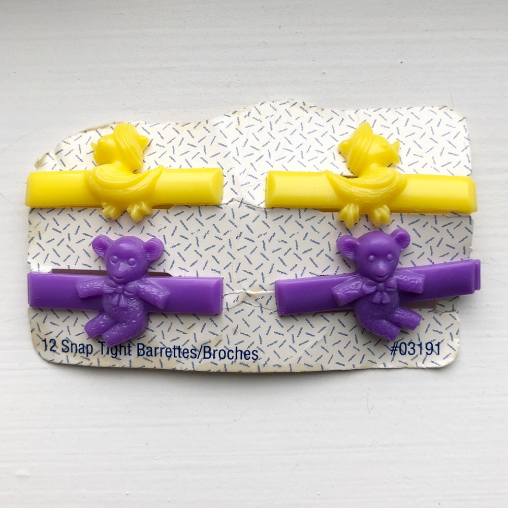 Vintage yellow & purple animal snap barrettes